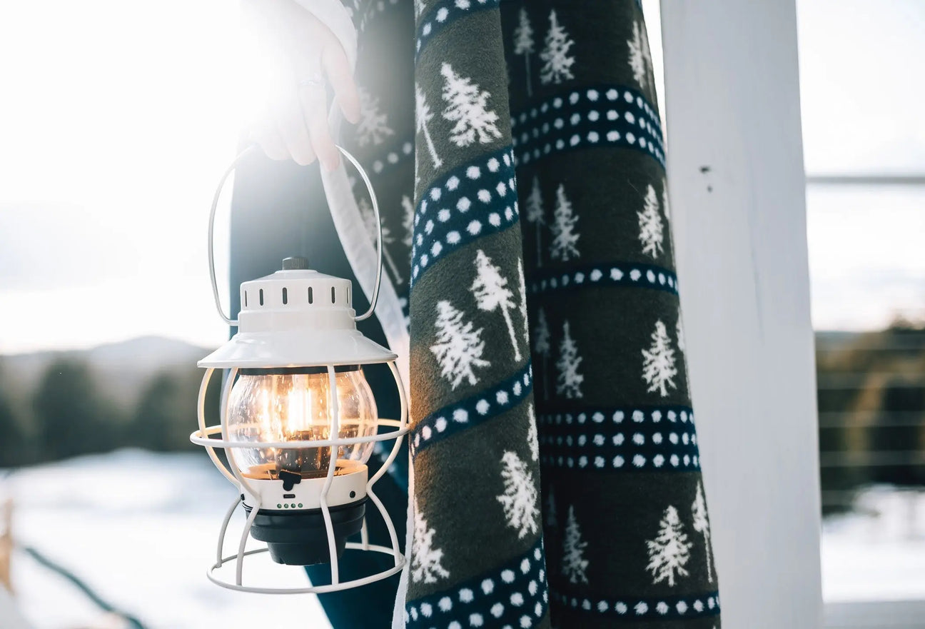 The Woods Maine Three Pines ChappyWrap in Navy with Barebones antique white rechargeable lantern