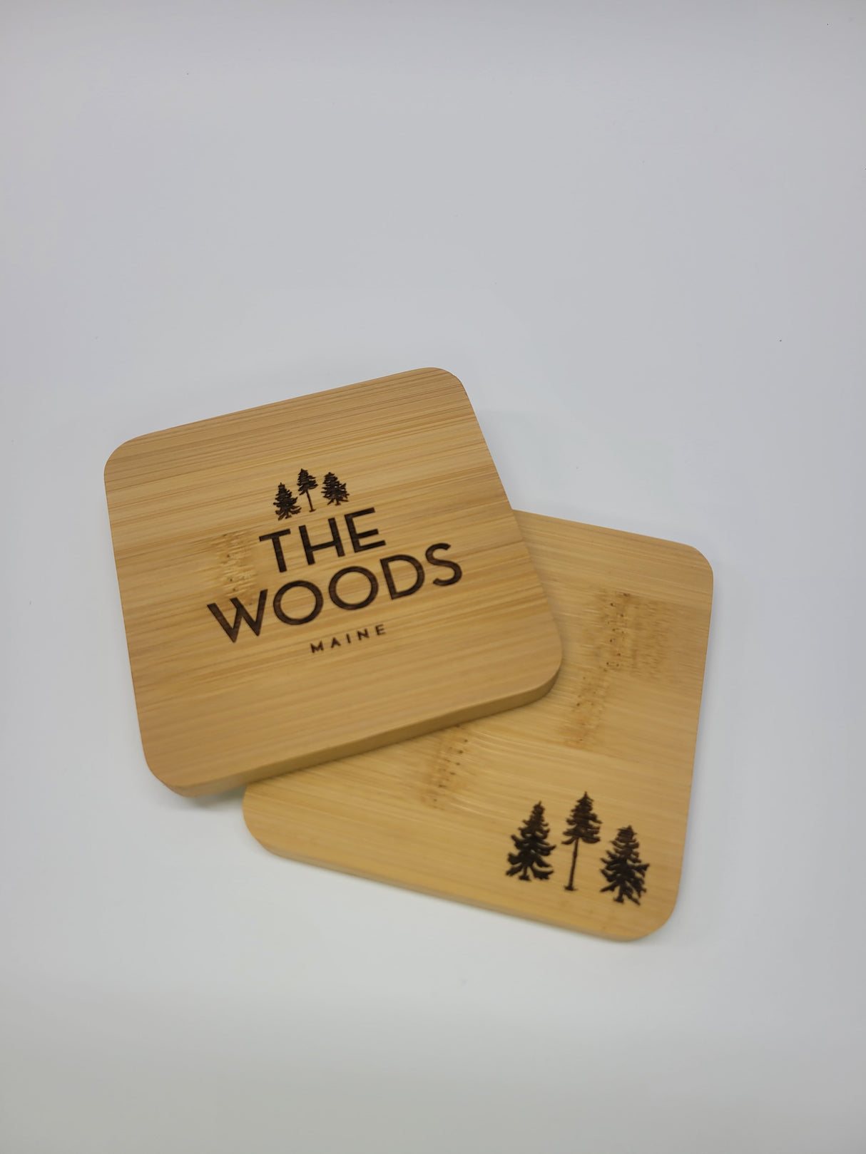 The Woods Maine: Three Pines® Bamboo Coasters (Set of 4)