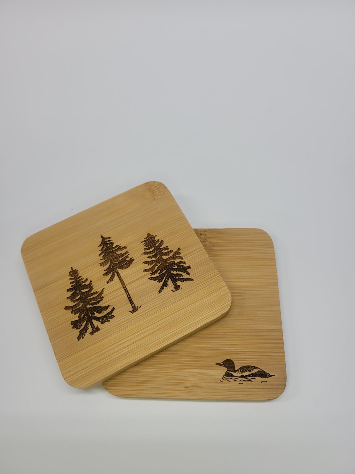 The Woods Maine: Three Pines® Loon Bamboo Coasters (Set of 4)