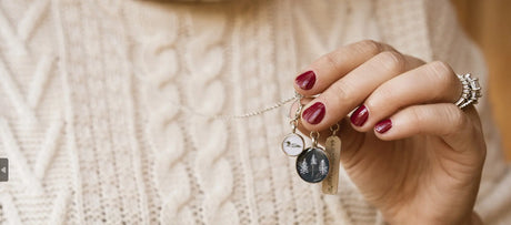 inspired by the lakes of Maine. The Woods Maine Three Pines Loon Charm Necklace . Made in Portland , Maine